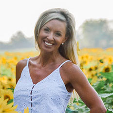 A portrait of Randi Cole, patient of Associated Audiologists.