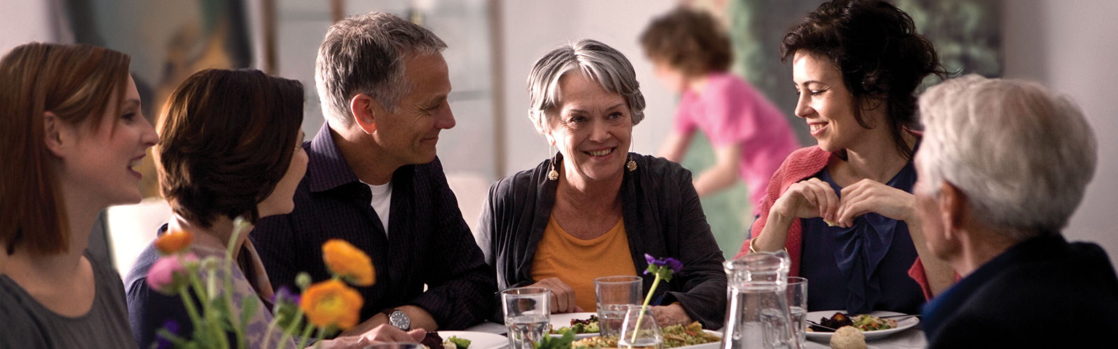 a couple out eating at a table