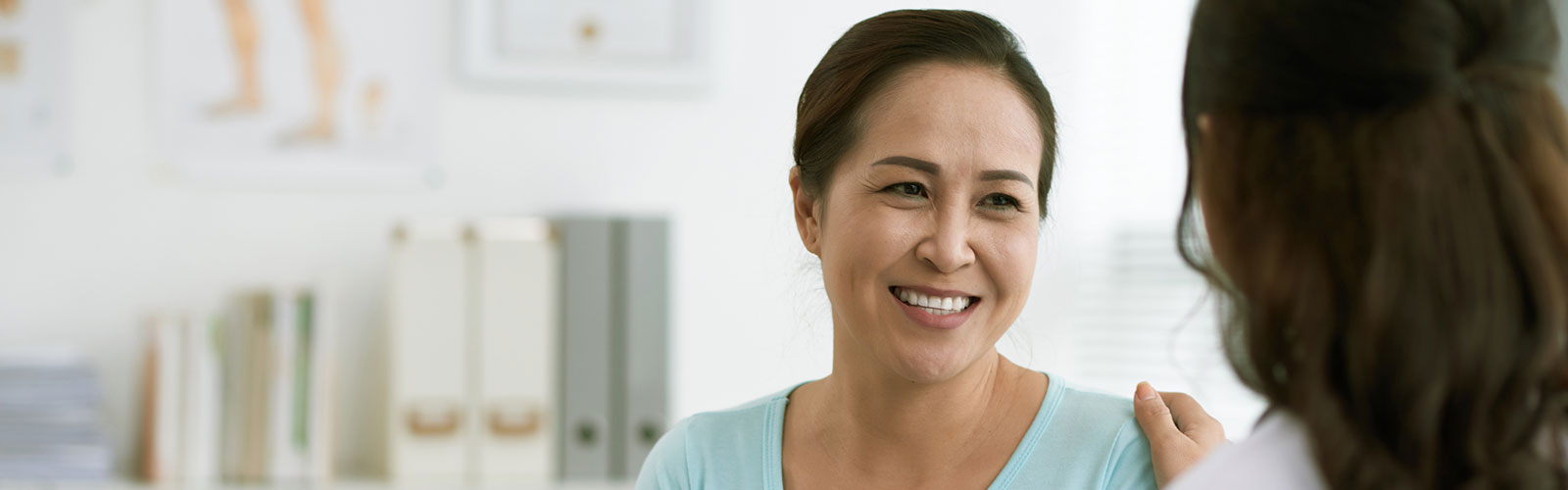 woman discussing hearing options with her provider