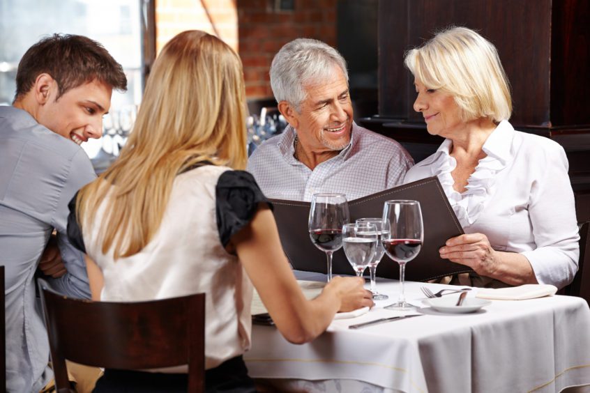 family enjoying a meal at a restaurant