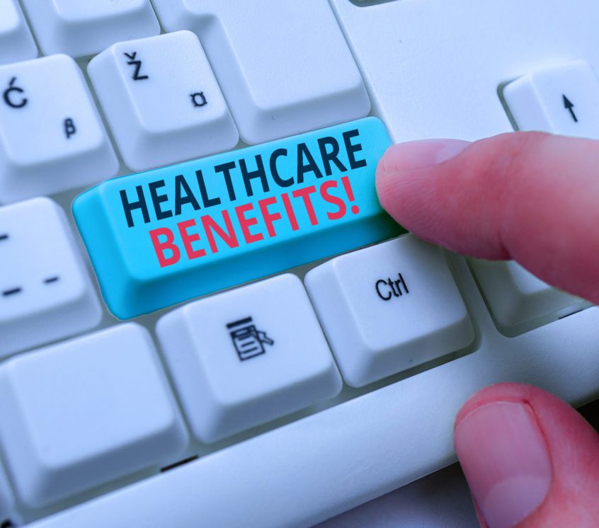 the words Healthcare Benefits on a white keywboard