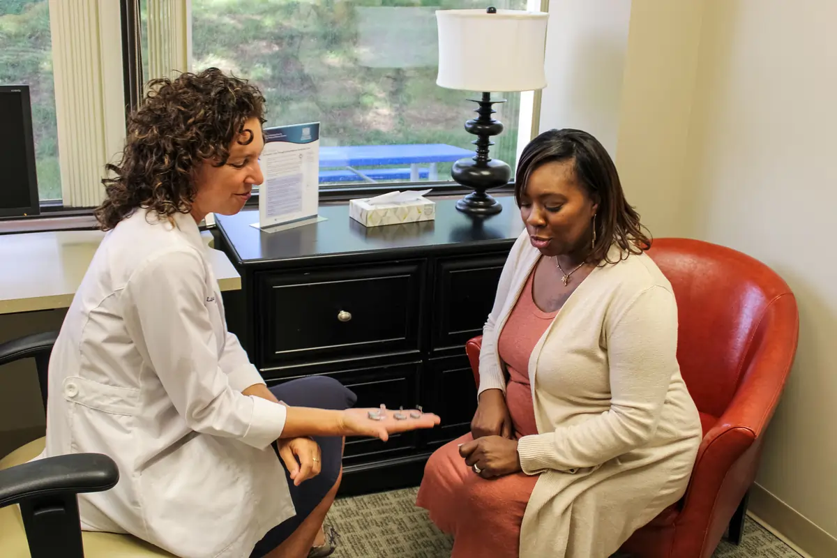 Dr. Battani with a patient at Associated Audiologists in Shawnee Mission, KS