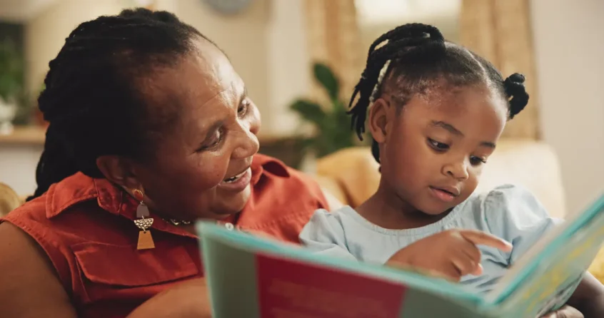 grandma reading to grandchild, Associated Audiologists Kansas City auditory processing disorder